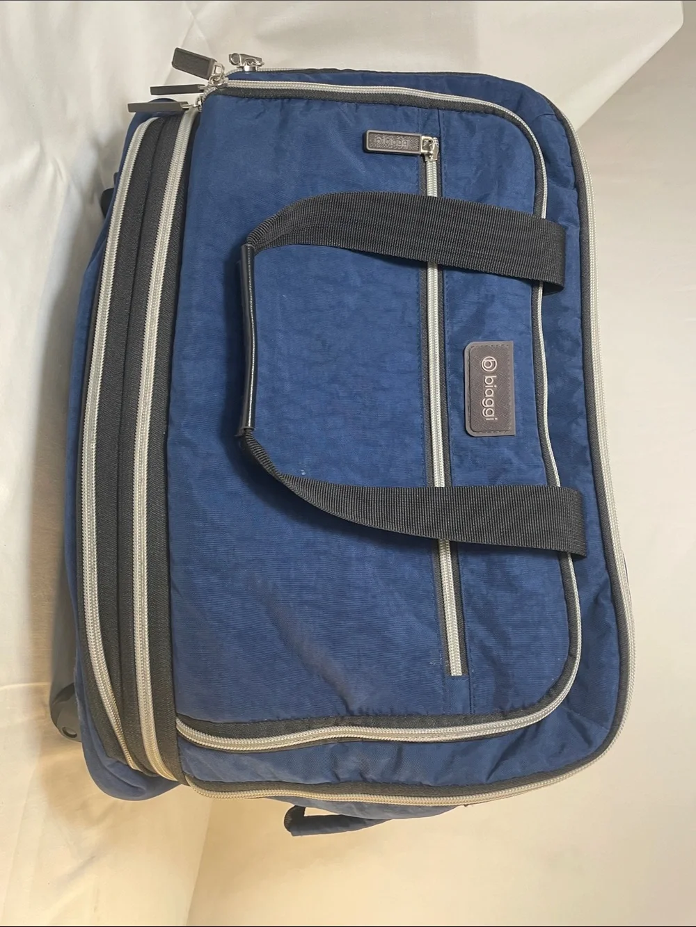 Baggallini Blue Zipsak Boost Spinner Duffle travel camp getaway expandable lite